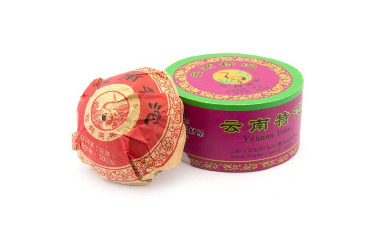 Pressed Raw Pu-erh Tea - Шэн пуэр 2017 г. «Люкс» марки «Сосна и журавль» завода «Сягуань» гнездо 100 г