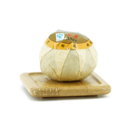 Pressed Rip Pu-erh Tea - Shu pu-erh in a tangerine, 