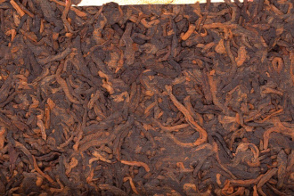 Pressed Rip Pu-erh Tea - Шу пуэр 2011 г. «Выдержанный аромат» марки «Пагода» завода «Лимин» 357 г, 