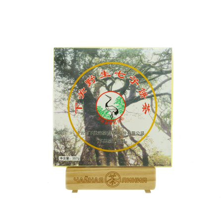 Pressed Raw Pu-erh Tea - Шэн пуэр 2005 г. "Чай с диких деревьев" марки "Сосна и журавль" завода "Сягуань" блин 357 г, 