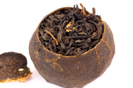 Pressed Rip Pu-erh Tea - Shu Pu-erh in a Golden Horse Mandarin, 