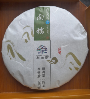 Pressed Rip Pu-erh Tea - Шу пуэр 2023 г. "Наньно" бренда "Tea King Village", 357 г