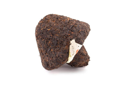 Pressed Raw Pu-erh Tea - Sheng pu-erh 2004, brand "Sacred Flame", from the Xiaguan factory, mushroom 250 g, 