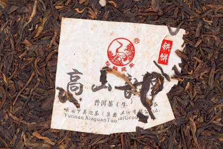 Pressed Raw Pu-erh Tea - Sheng pu-erh 2014 "Mountain Melody" of the "Pine and Crane" brand from the "Xiaguan" factory, cake 357 g, 