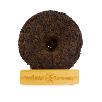 Pressed Rip Pu-erh Tea - Shu Puer 2016 "Tea from wild tall trees with the aroma of camphor from Yiwu" from the Zhoushi factory, 357 g, 