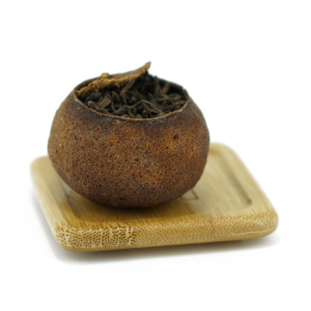 Pressed Rip Pu-erh Tea - Shu pu-erh in a tangerine, 