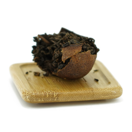 Pressed Rip Pu-erh Tea - Shu pu-erh in a tangerine, 