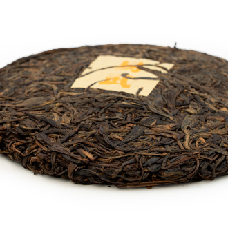 Pressed Raw Pu-erh Tea - Sheng Pu-erh 2006 from Yiwu Mountains 357 g, 
