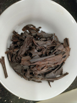 Pressed Raw Pu-erh Tea - Шэн пуэр 2003 года "Зелёная марка" CNNP 357 г, 