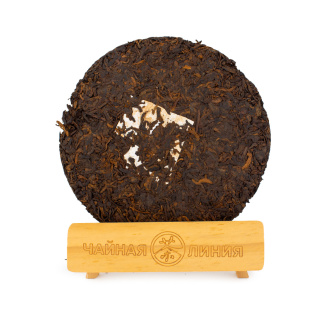 Pressed Rip Pu-erh Tea - Shu Puer 2016 "Tea from wild tall trees with the aroma of camphor from Yiwu" from the Zhoushi factory, 357 g, 