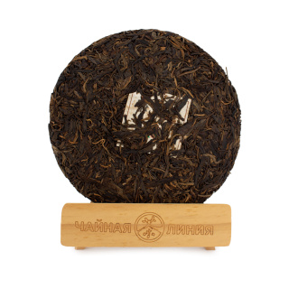 Pressed Raw Pu-erh Tea - Sheng pu-erh 2011 from 500-year-old trees of the Nanno Mountains of the Kaishunhao factory, 400 g, 