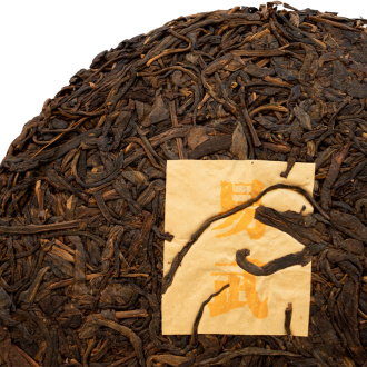 Pressed Raw Pu-erh Tea - Sheng Pu-erh 2006 from Yiwu Mountains 357 g, 