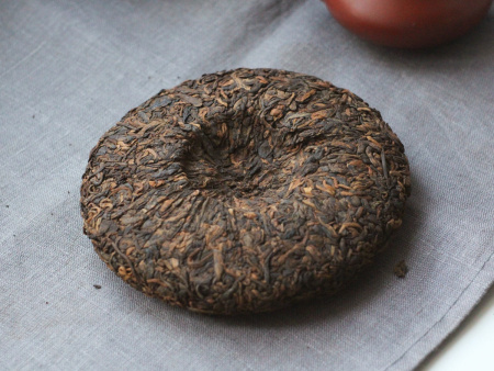 Pressed Rip Pu-erh Tea - Shu pu-erh "Nanben Laozhai" (from old trees from Nanben Laozhai) brand "Tea Line" 200 g., 