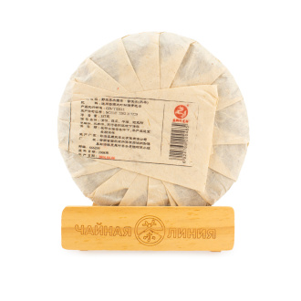Pressed Rip Pu-erh Tea - Shu Puer 2016 "Tea from wild tall trees with the aroma of camphor from Yiwu" from the Zhoushi factory, 357 g, 
