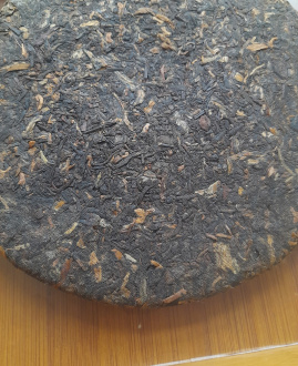 Pressed Rip Pu-erh Tea - Шу пуэр 2023 г. "Наньно" бренда "Tea King Village", 357 г, 