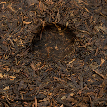 Pressed Raw Pu-erh Tea - Sheng Pu-erh 2006 from Yiwu Mountains 357 g, 